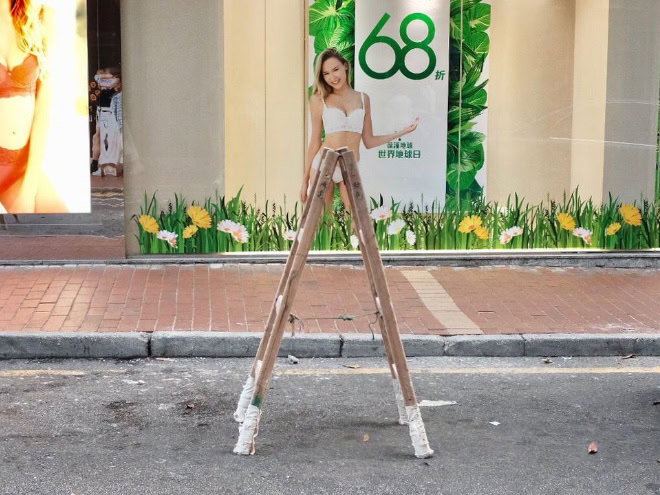 Accidentally funny street photo by Edas Wong.